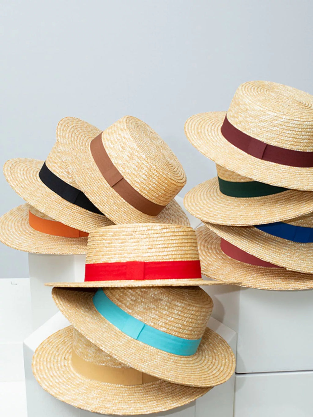 Plush Fashion Hub classic wheat straw boater hat with decorative ribbon, perfect elegant summer accessory and sun protection.