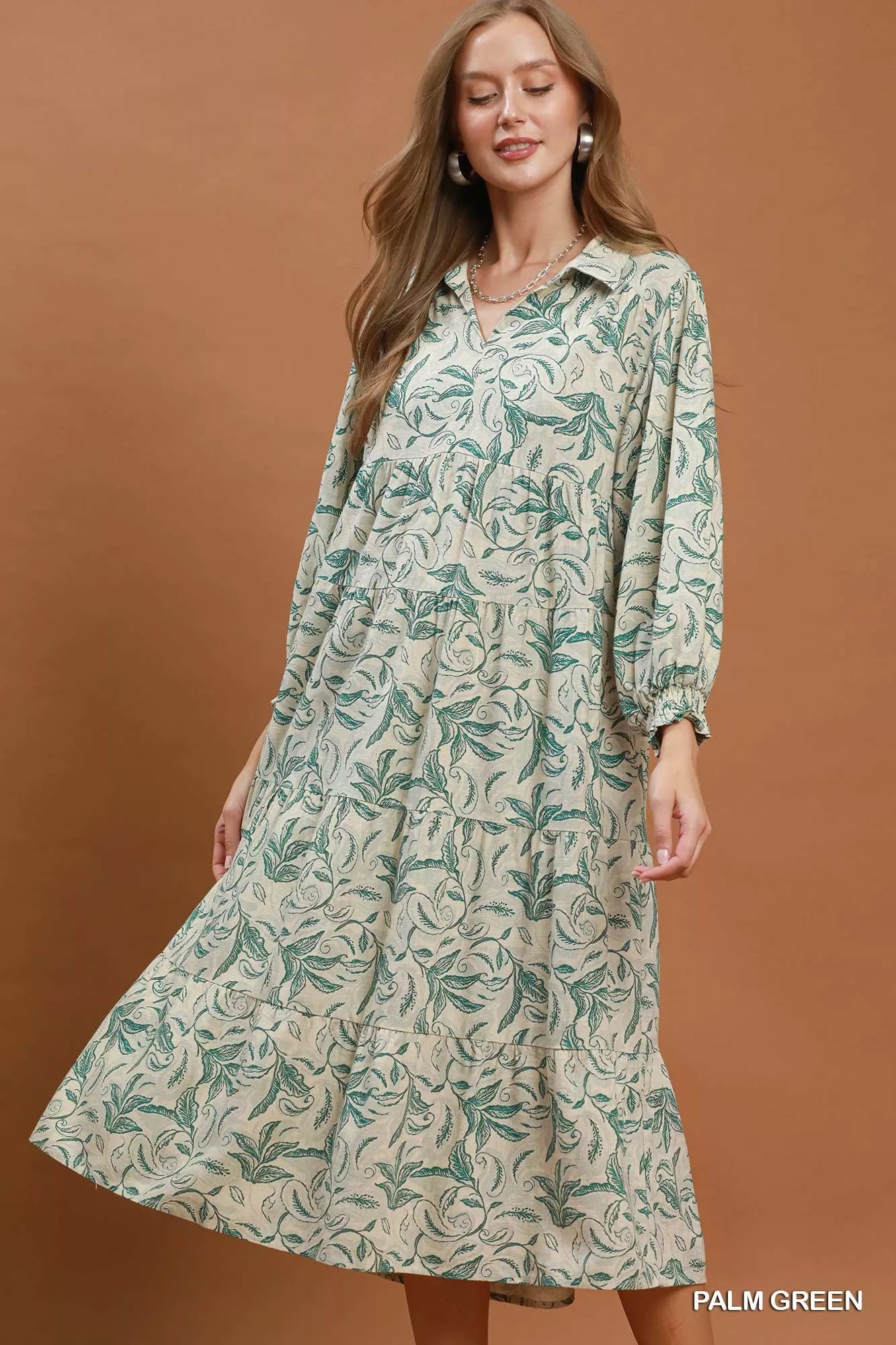Umgee linen botanical print tiered midi dress featuring a flowy silhouette and natural fabric for a stylish, bohemian look.
