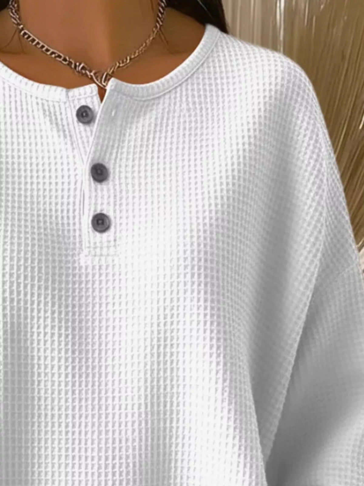 Plus size waffle knit top with button details from Trendsi, featuring a cozy, textured fabric and relaxed fit in full size.
