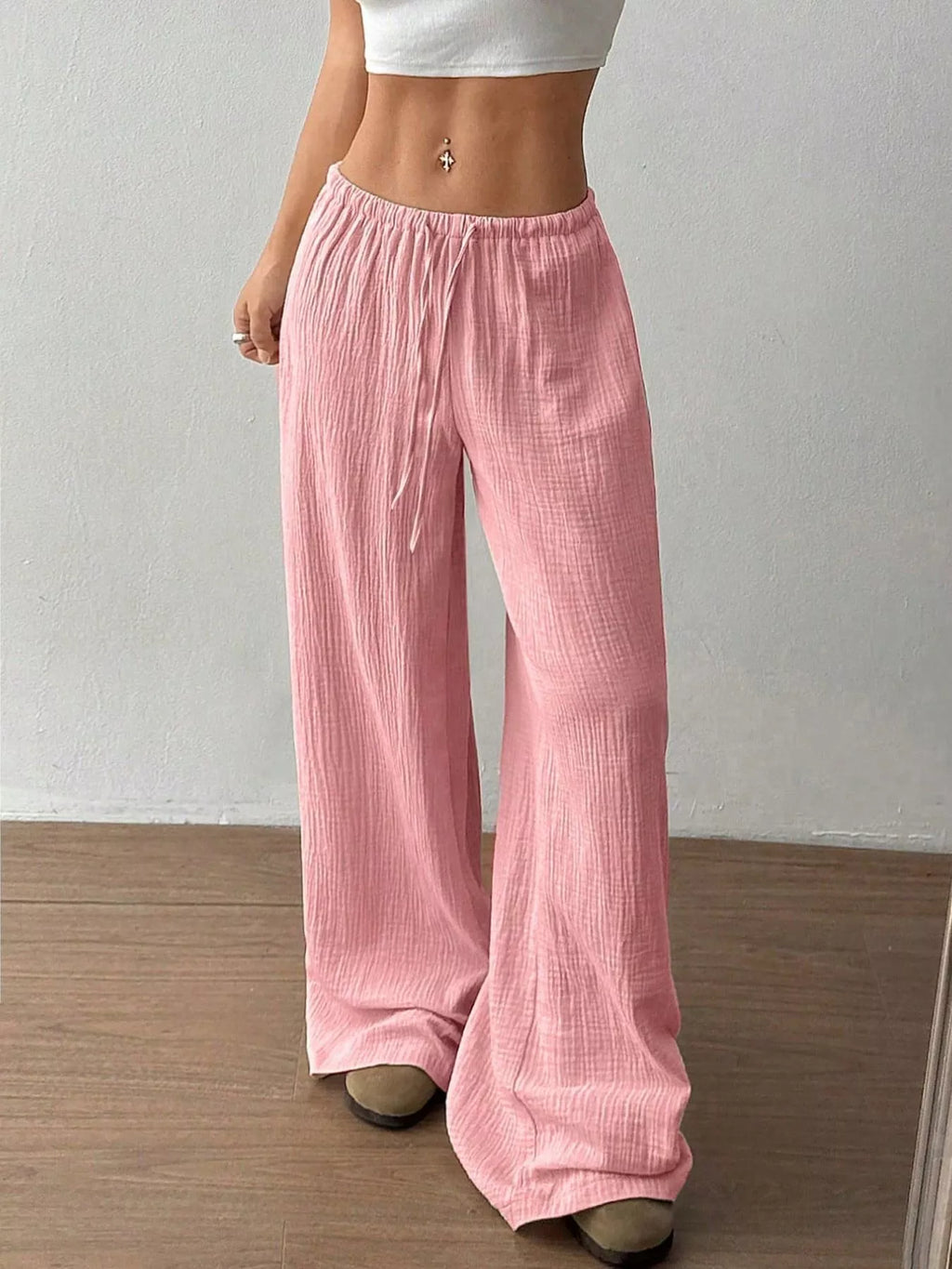 Wide-leg drawstring pants by Trendsi featuring a relaxed fit, lightweight fabric, and adjustable waistband, shown in the image.