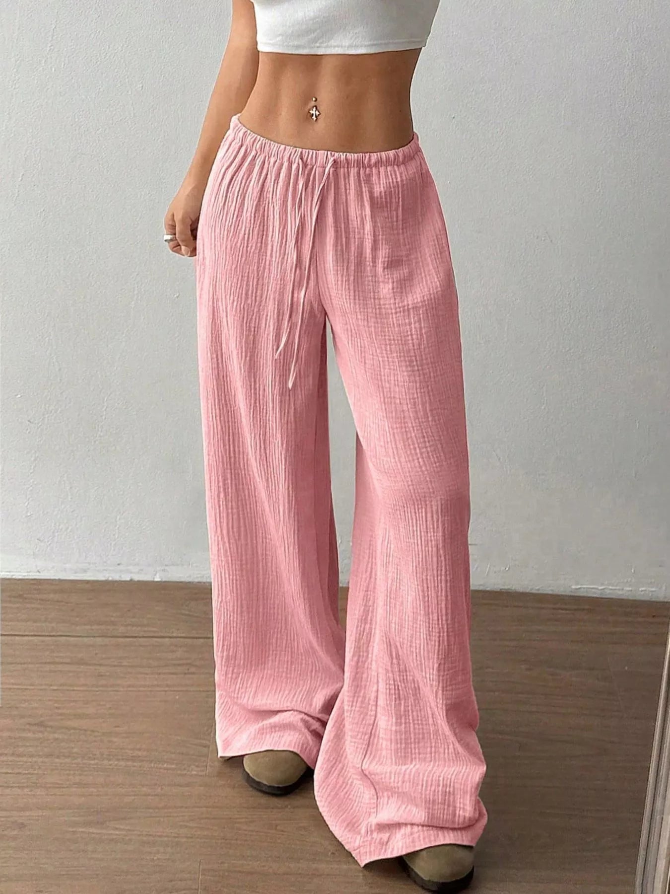Wide-leg drawstring pants by Trendsi featuring a relaxed fit, lightweight fabric, and adjustable waistband, shown in the image.