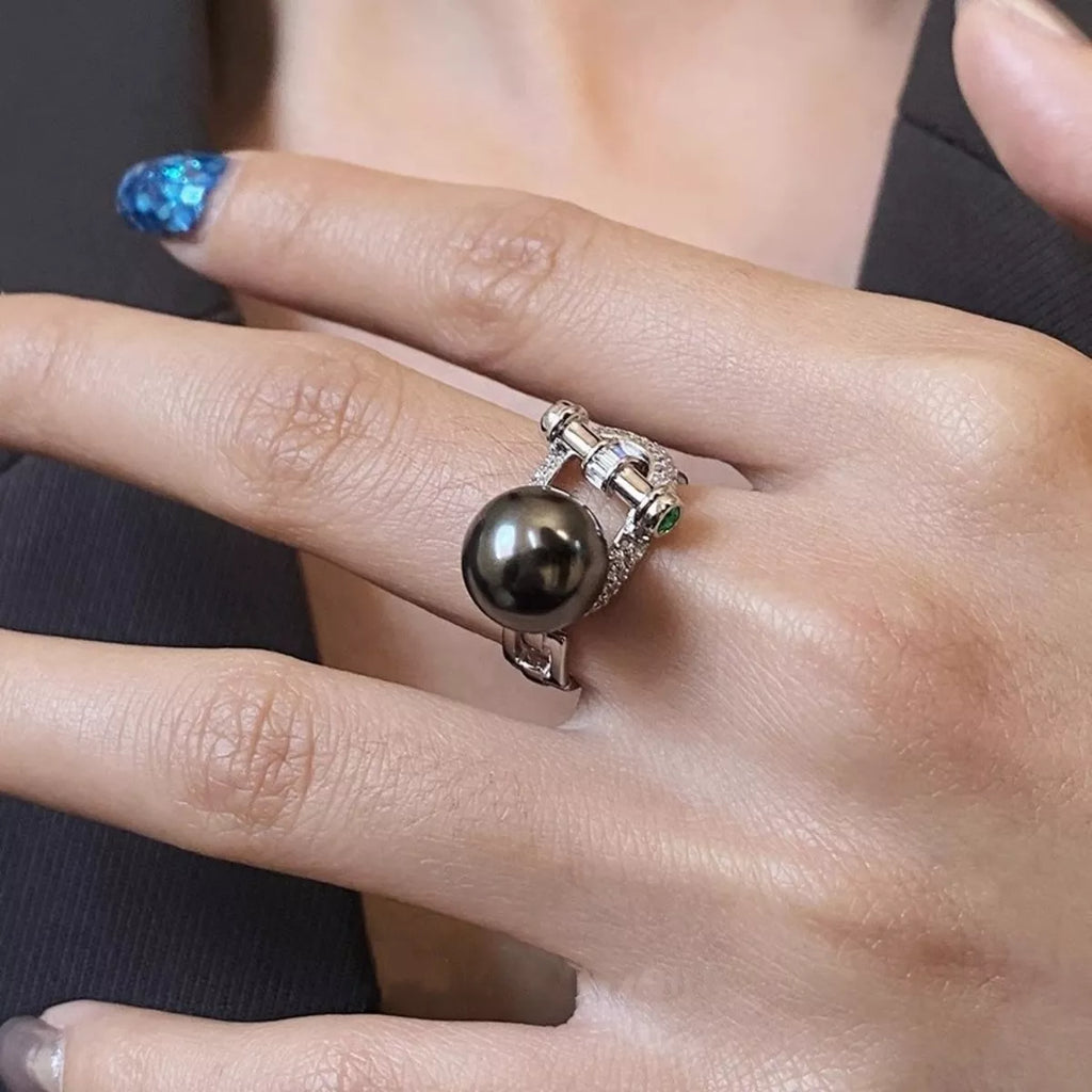 925 Sterling silver ring with zircon and pearl, showcasing elegant jewelry design and craftsmanship.