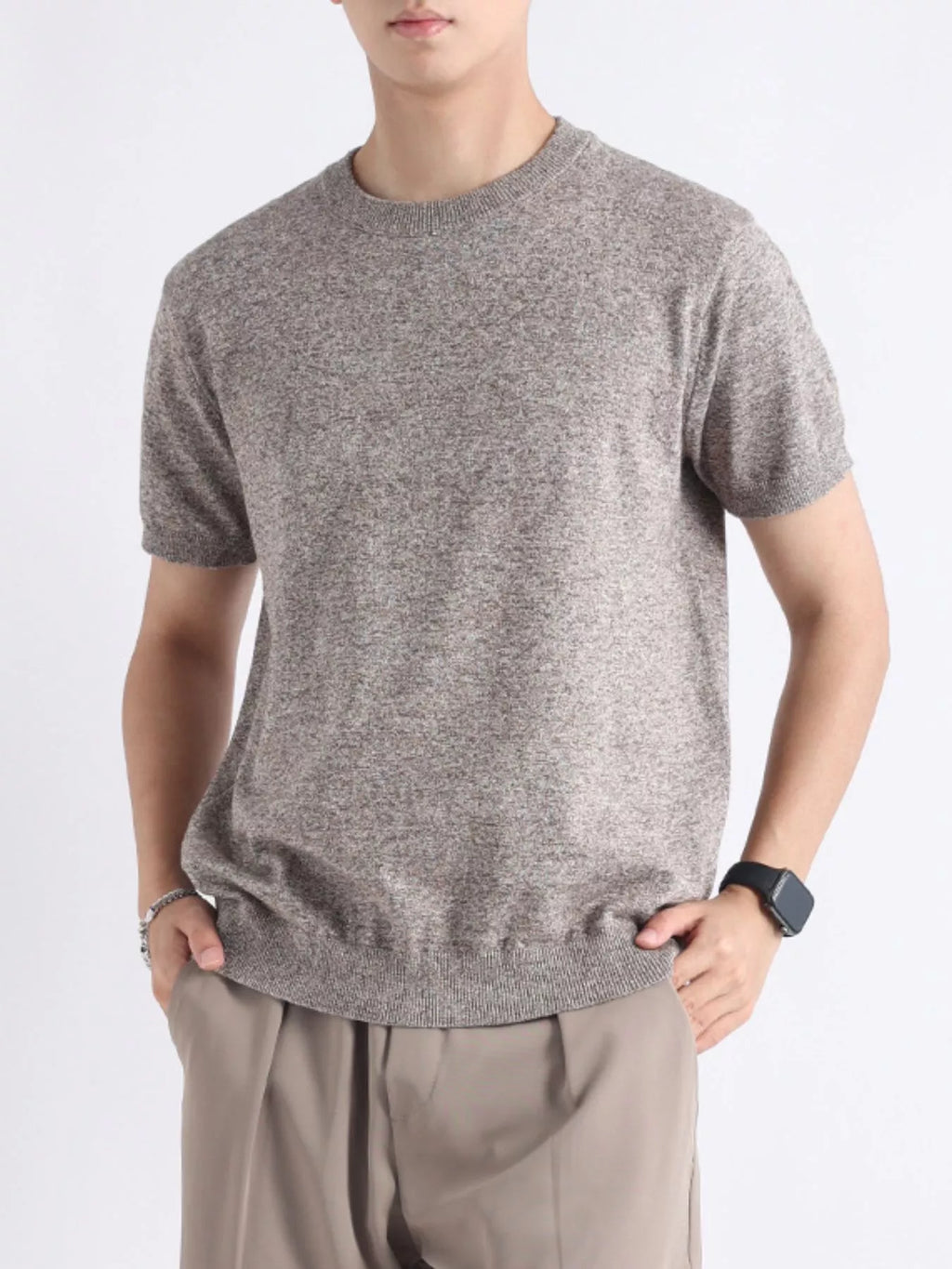 Plus size men's casual knitted short sleeve T-shirt from Trendsi, showcasing a comfortable, stylish knit top in a relaxed fit.