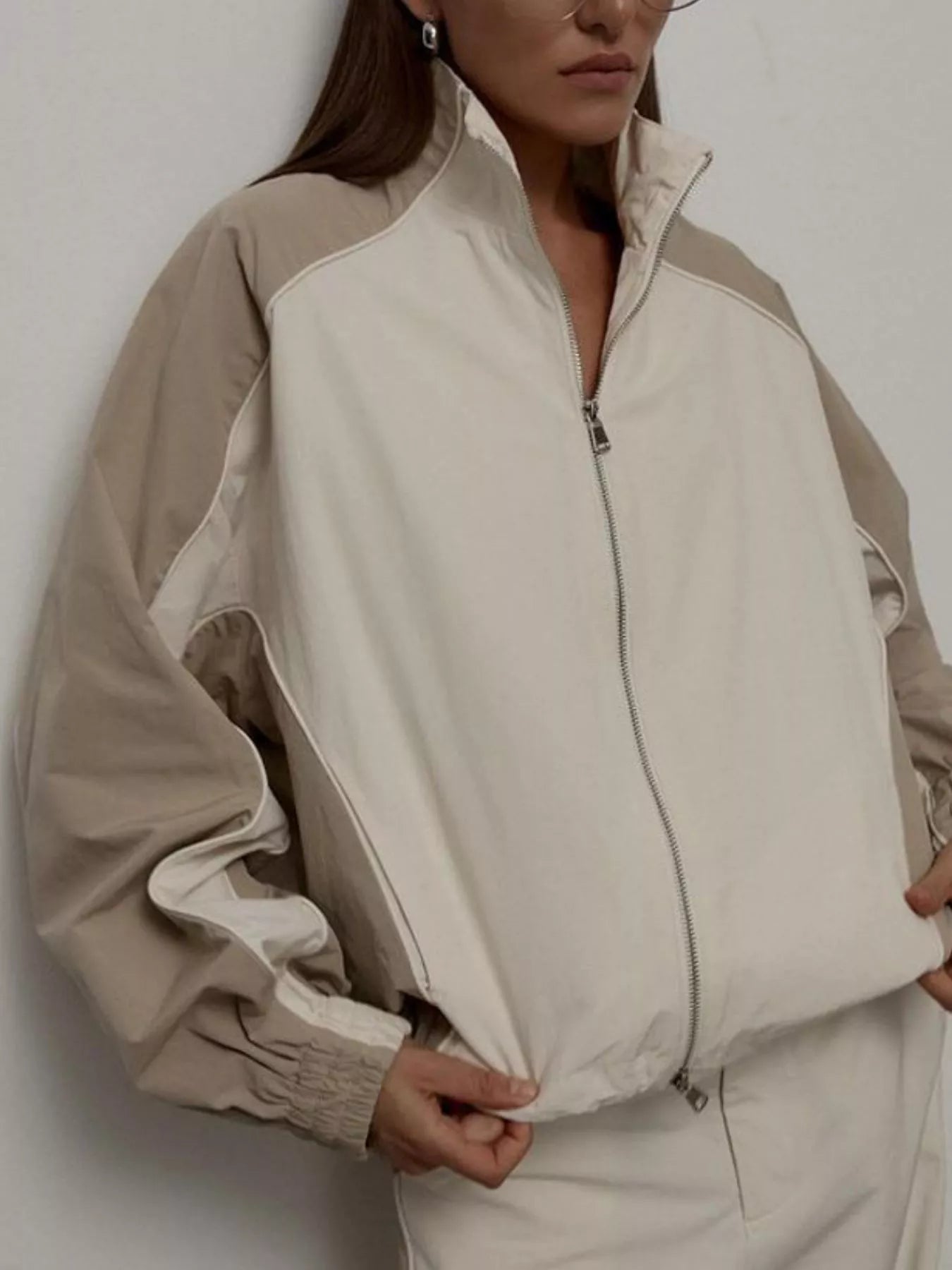 Color block zip-up outerwear and pants set by Plush Fashion Hub, featuring vibrant color blocking and casual athletic style.