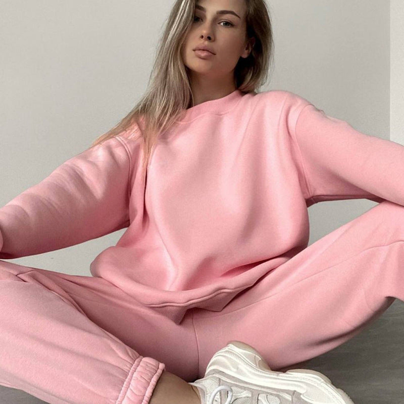 Plush Fashion Hub women's two-piece crewneck sweatshirt and jogger pants set in a loose fit, comfortable casual loungewear ensemble.