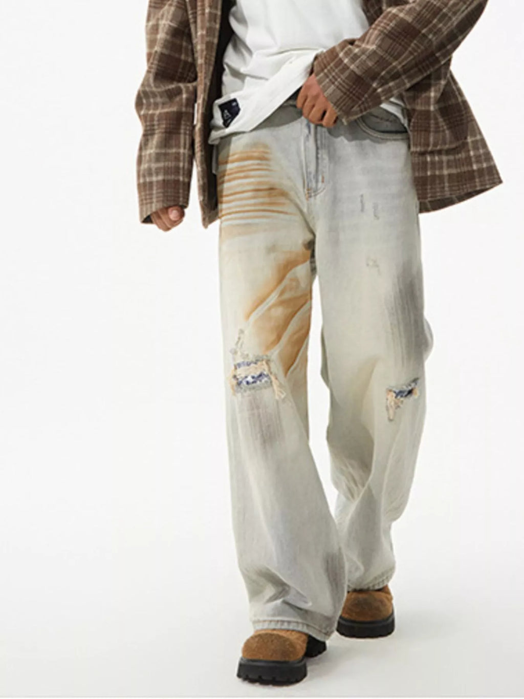 Men's distressed wide leg jeans from Trendsi, showing casual fit with ripped details and relaxed wide leg style.