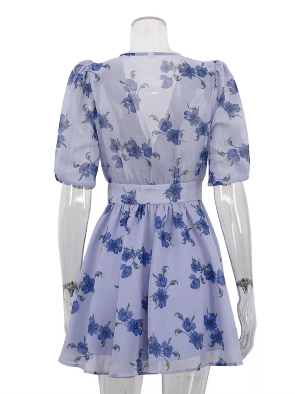 Floral puff sleeve mini dress by Shopimist featuring a fitted bodice, short puffed sleeves, and a flowy skirt in vibrant floral print.