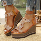 Butterfly embellished wedge sandals from Shopimist featuring colorful butterfly decorations and comfortable wedge heels.