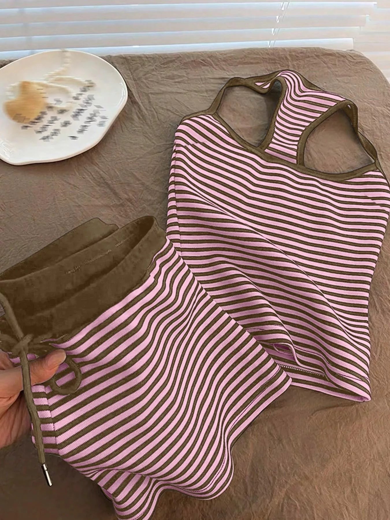Striped tank top and shorts set by Trendsi, featuring a stylish casual design with colorful vertical stripes.