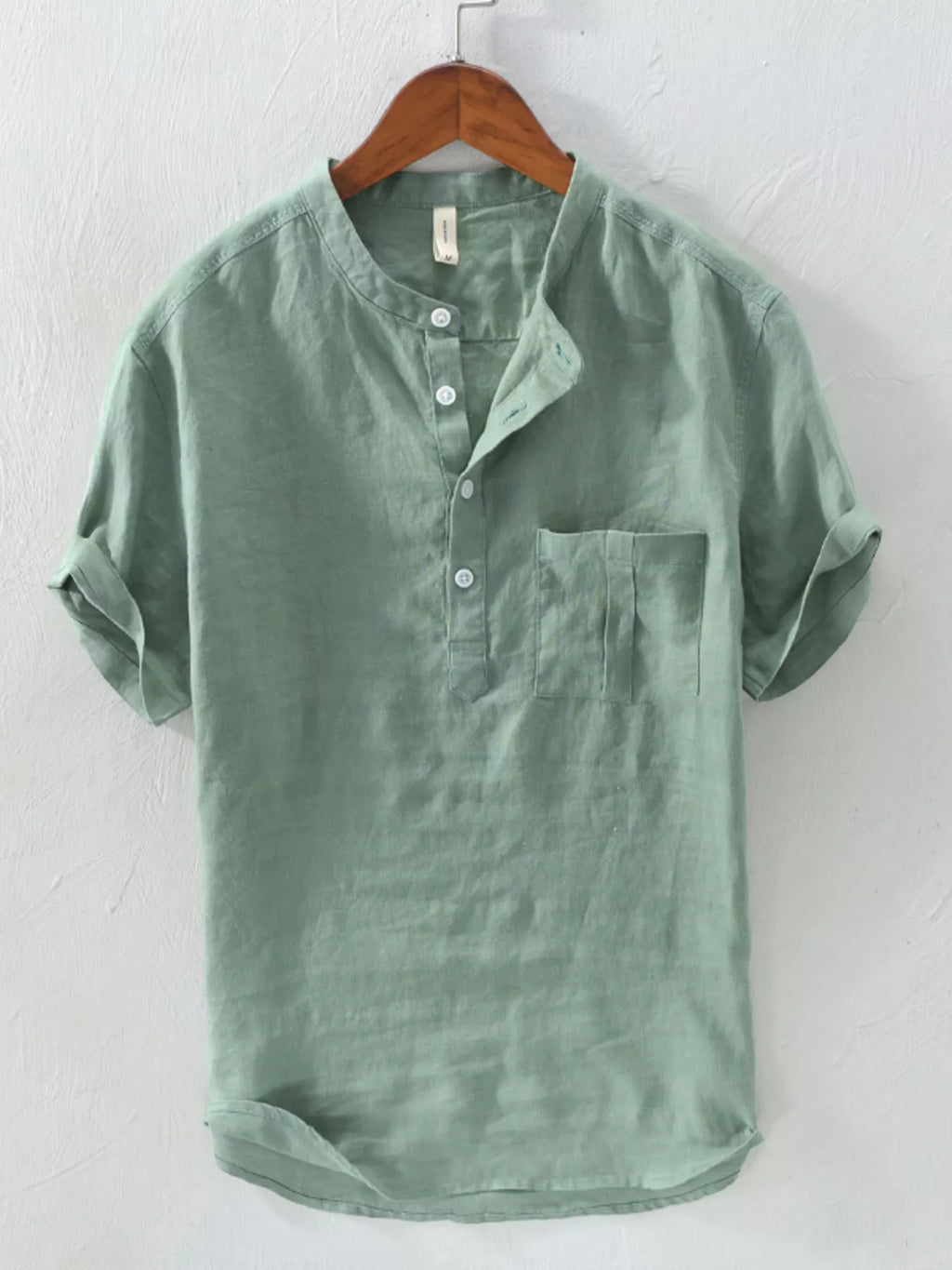 Men's casual cotton blend short sleeve button-down shirt with front pocket, stylish and comfortable for everyday wear.