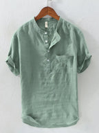 Men's casual cotton blend short sleeve button-down shirt with front pocket, stylish and comfortable for everyday wear.