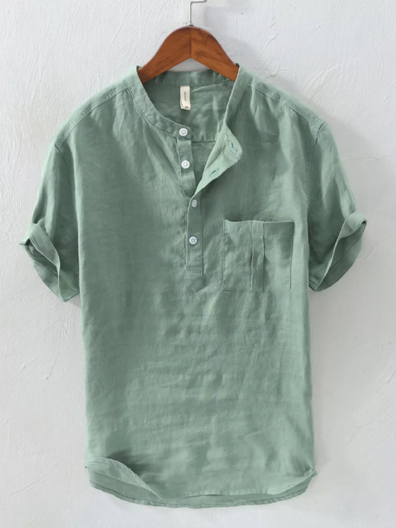 Men's casual cotton blend short sleeve button-down shirt with front pocket, stylish and comfortable for everyday wear.