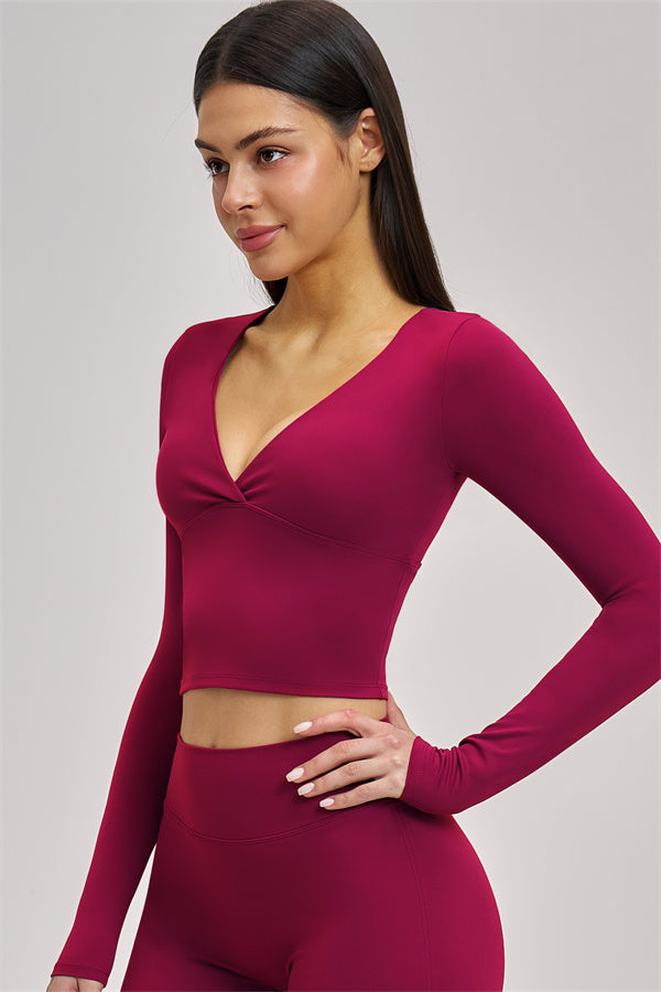 Fitglutes Activewear long sleeve crop top, stylish gymwear with fitted design and comfortable fabric for workout and sports activities.