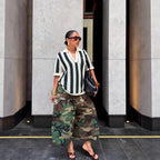 Women's wide-leg cargo pants with zipper and button details, from Plush Fashion Hub, featuring a relaxed fit and utility style.