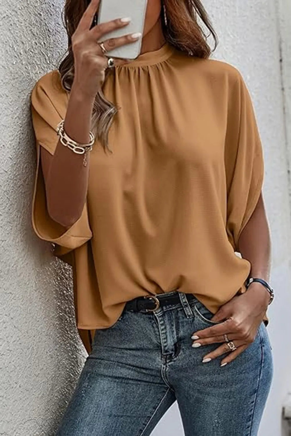 Elegant Plush Fashion Hub tie-back half-sleeve blouse with side slit, stylish top featuring a sophisticated design and comfortable fit.
