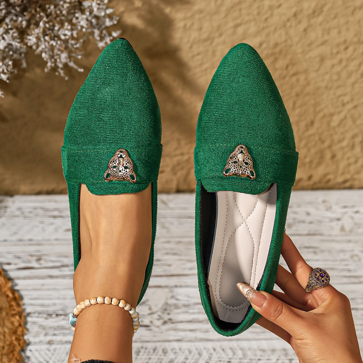 Point toe slip-on footwear by Trendsi featuring sleek design and comfortable fit, perfect for stylish everyday wear.