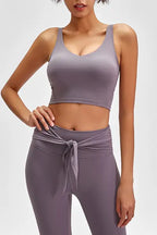 Millennia Scoop Back Sports Bra by Trendsi, activewear with a supportive fit and stylish scoop back design.