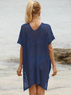 Openwork V-neck slit cover-up from Trendsi featuring lightweight fabric and stylish design for beach or poolside wear.