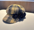 Plush Fashion Hub checkered beret with warm autumn and winter style, featuring classic black and white pattern on soft fabric.