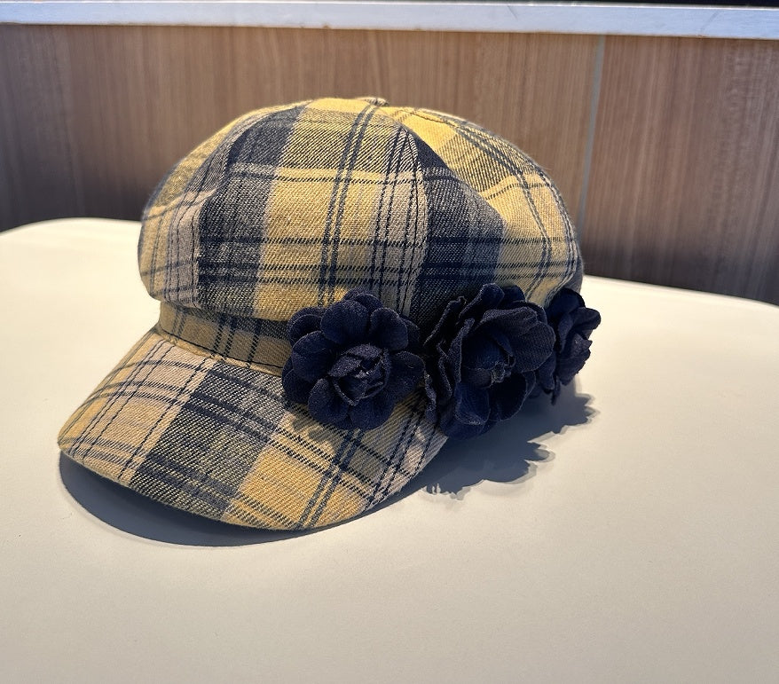 Plush Fashion Hub checkered beret with warm autumn and winter style, featuring classic black and white pattern on soft fabric.