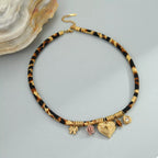 Leopard 18K gold-plated necklace with a detailed leopard pendant, stylish jewelry accessory by Shopimist