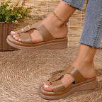 Open toe buckle sandals by Shopimist featuring a stylish strap design and comfortable flat sole for casual wear.