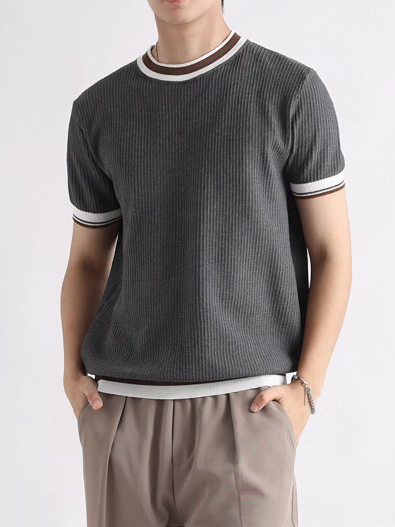 Plus size men's contrast trim T-shirt from Trendsi, featuring short sleeves and a casual, stylish design.