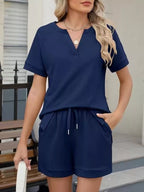 Trendsi solid color short sleeve top and shorts two-piece set, casual summer outfit, lightweight fabric, perfect for warm weather.