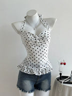 Polka dot halter neck camisole top by Plush Fashion Hub, featuring a stylish design with adjustable straps and a comfortable fit.