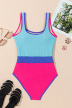Rory Patchwork One Piece Swimsuit by Threaded Pear featuring colorful patchwork design and classic one-piece fit.