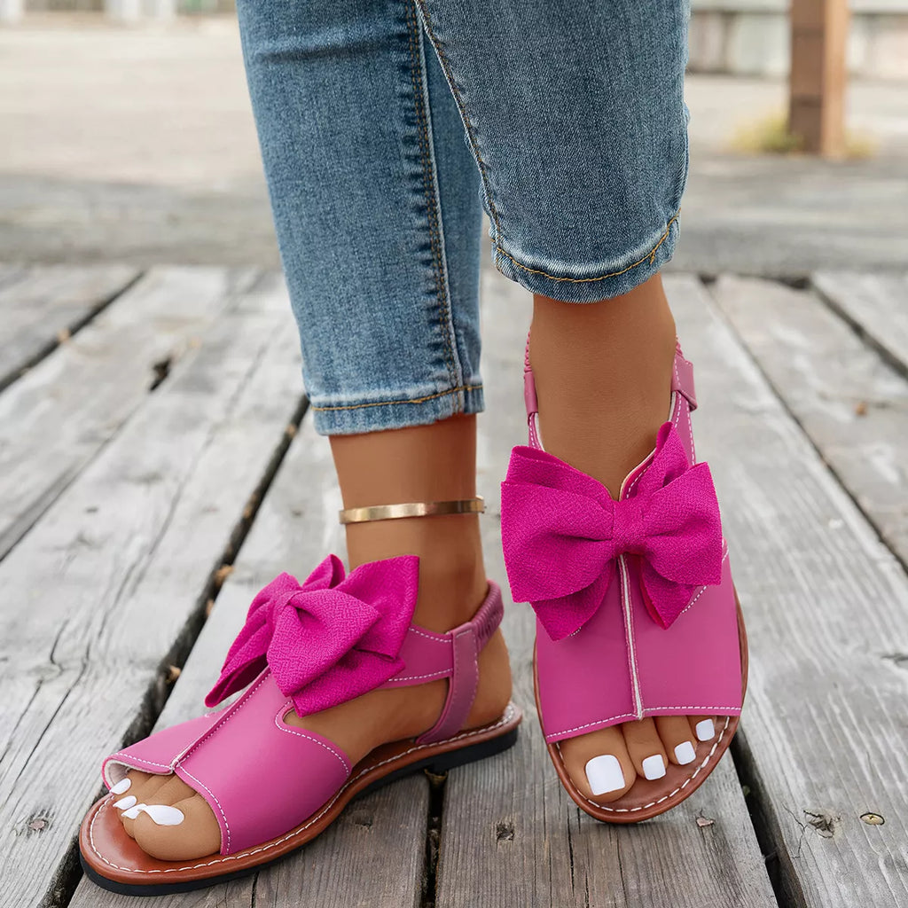 Open toe bow sandals by Shopimist featuring stylish design, open toe front, and elegant bow detail on the straps.