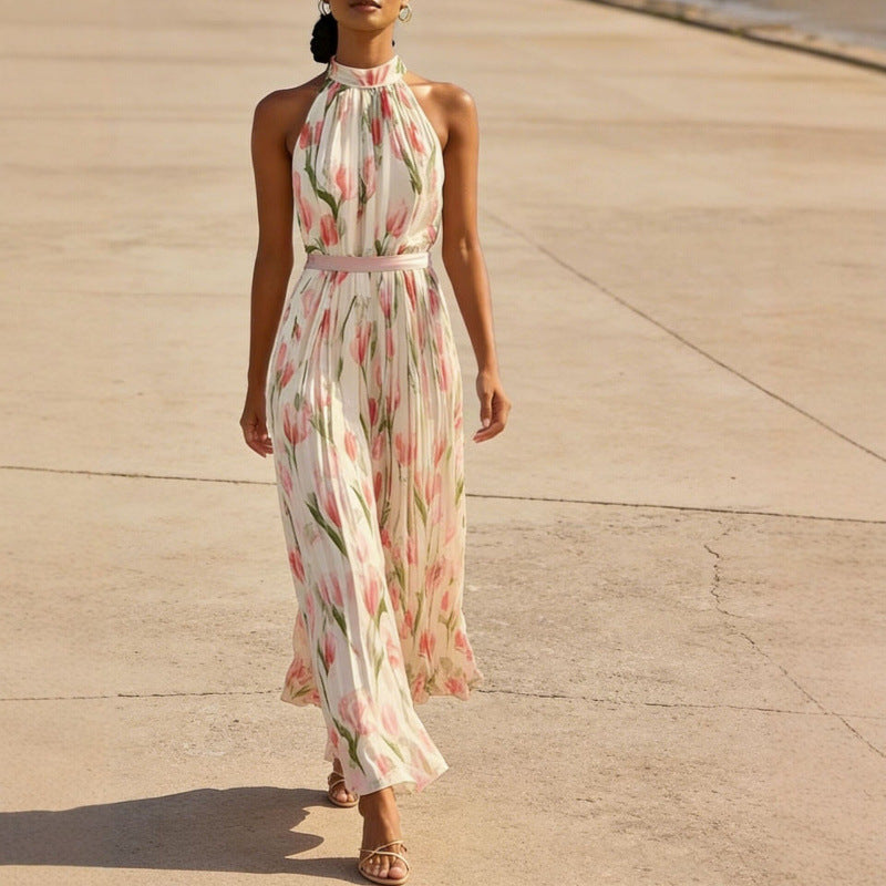 Women's halterneck high-waist swing dress by FitiqueFit featuring floral and solid print casualwear, flowing fabric and sleeveless design.