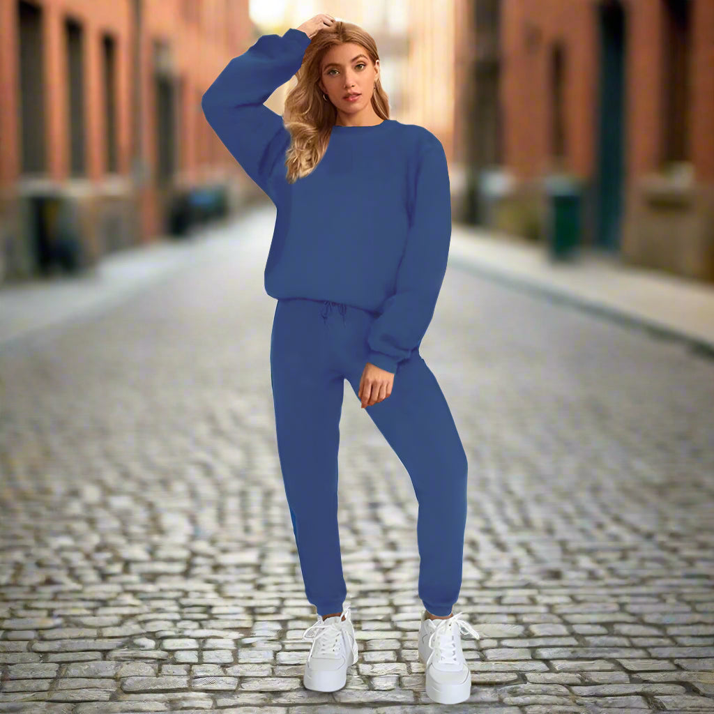 Women’s solid color round neck pullover sweatshirt and pants set by Plush Fashion Hub, casualwear with relaxed fit and comfortable fabric.