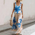 Women's sleeveless floral printed vest and pants two-piece set by FitiqueFit, featuring vibrant floral patterns and comfortable fabric.