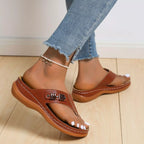 Women's comfortable toe post wedge sandals by Trendsi, stylish summer footwear with cushioned footbed and trendy design.