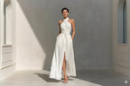 Slim-fit, sleeveless white casual dress by FitiqueFit featuring elegant design and clean, classic style.