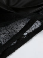 Women’s elegant lace midi skirt with sheer split detail, stylish women’s apparel by Trendsi, shown in a full-length view.