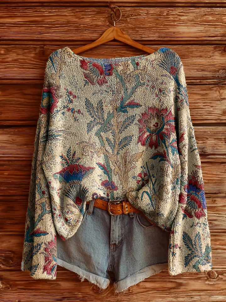 Women’s fall wildflower print long sleeve T-shirt from Plush Fashion Hub, featuring a colorful floral pattern on casual wear.