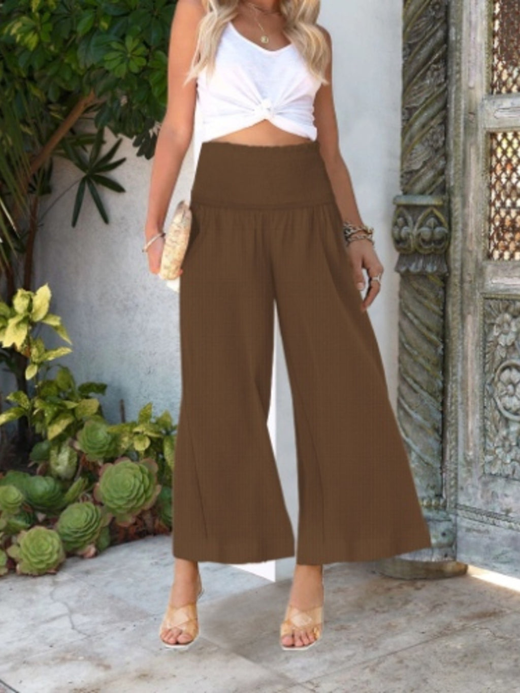 Women's lightweight wide-leg casual pants with smocked waist by Trendsi, featuring a relaxed fit and comfortable fabric.