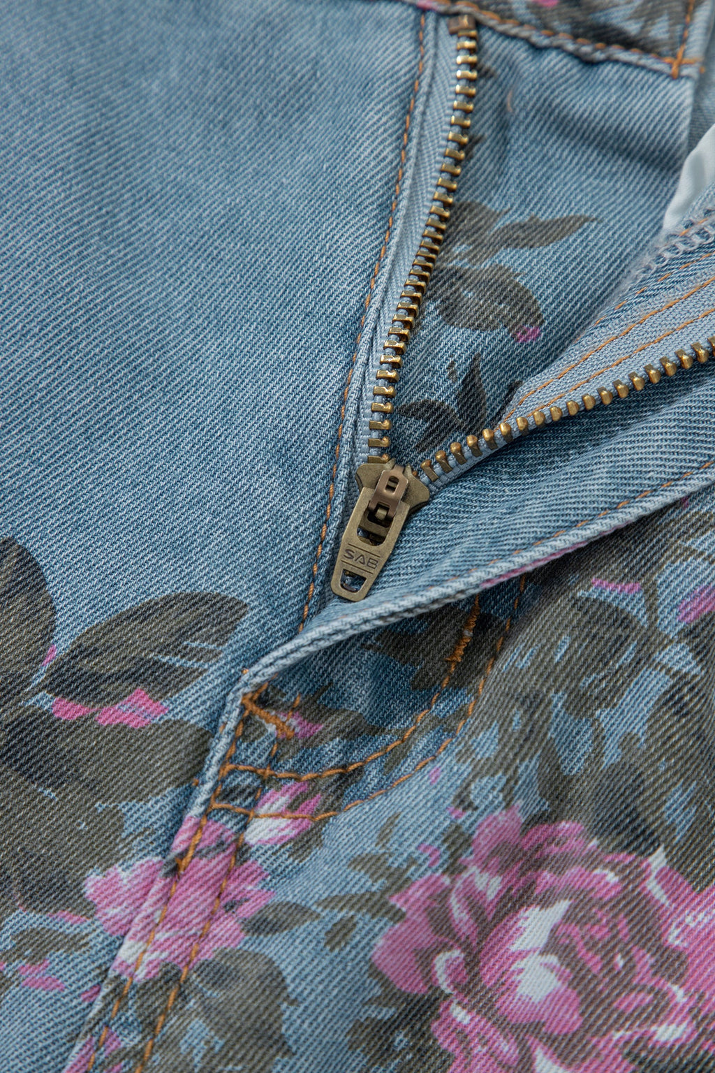 Esme Floral Print Bootcut Jeans by Threaded Pear showing floral pattern and classic denim fit with bootcut style.