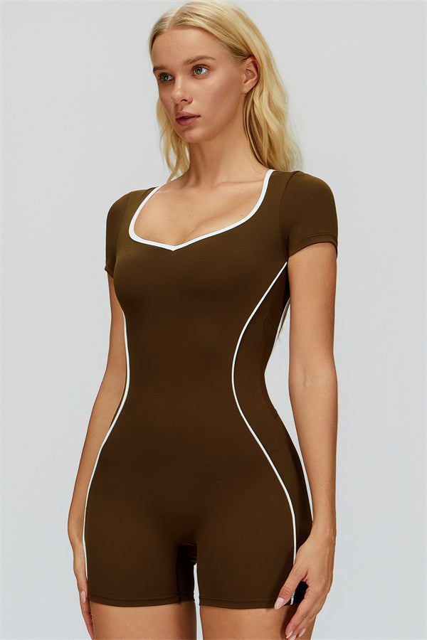 Fitglutes Activewear The Whisper Romper displayed on a model, showcasing its sleek gymwear design and comfortable fit.