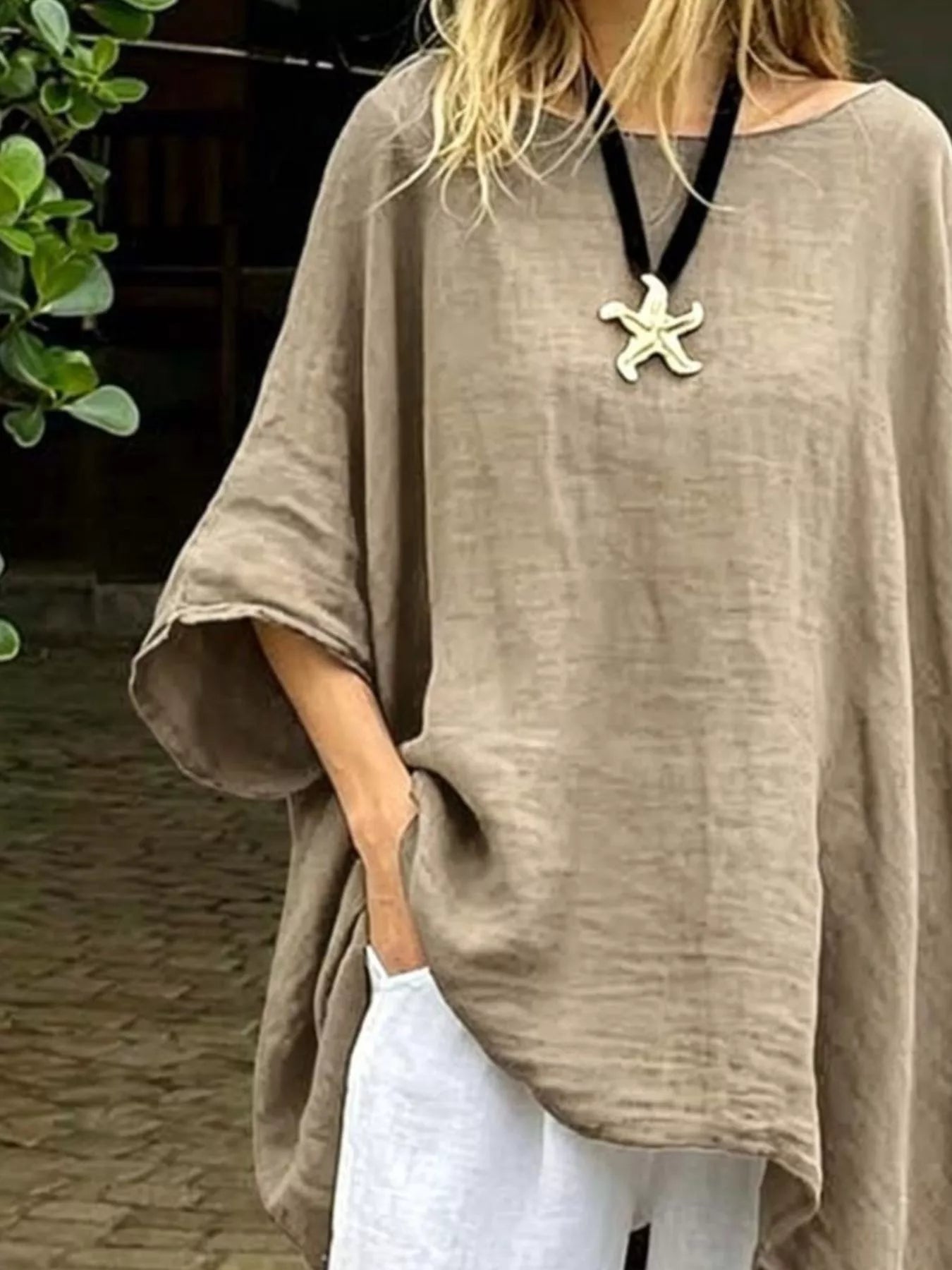 Plus size loose fit asymmetrical hem tunic top by Plush Fashion Hub, shown in a comfortable, flowing design with a stylish silhouette.