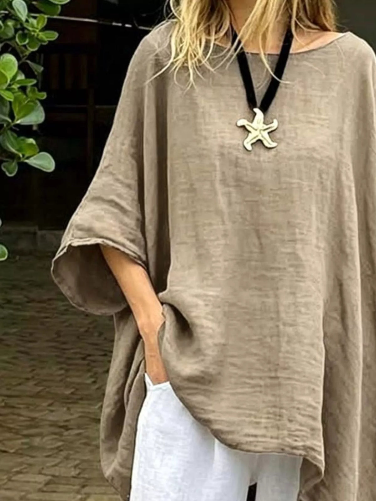 Plus size loose fit asymmetrical hem tunic top by Plush Fashion Hub, shown in a comfortable, flowing design with a stylish silhouette.