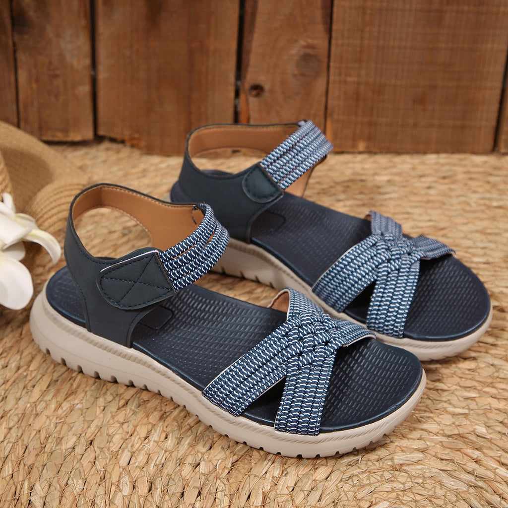 Women's open toe woven strap flat sandals with faux leather slides, featuring comfortable, stylish design by Trendsi.