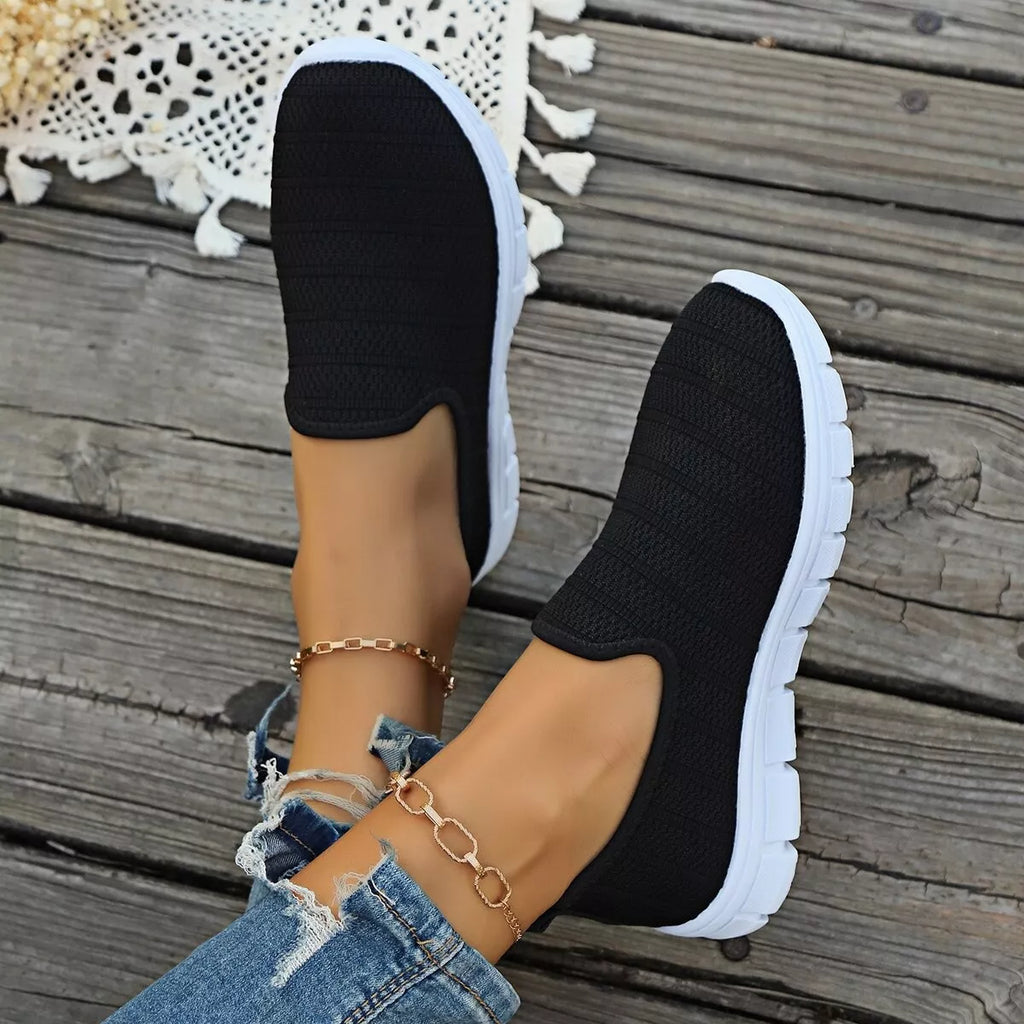 Women's breathable mesh slip-on casual walking flats by Trendsi, featuring lightweight comfort and stylish design.
