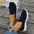 Women's breathable mesh slip-on casual walking flats by Trendsi, featuring lightweight comfort and stylish design.