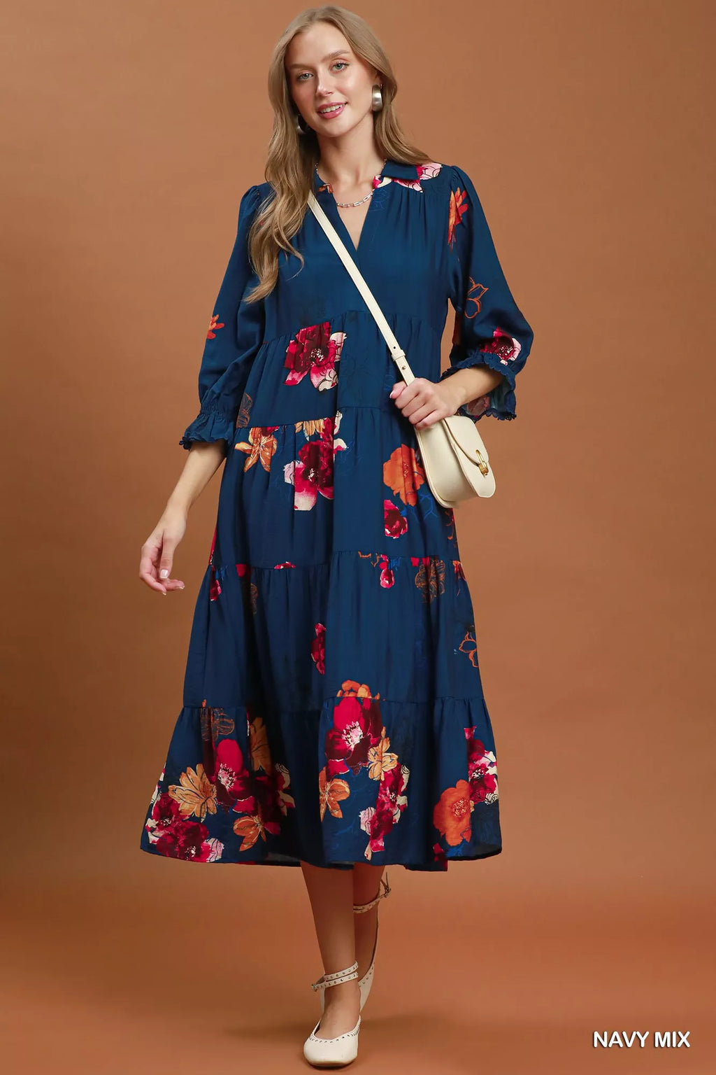 Umgee floral print tiered midi dress with puff sleeves, showcasing lightweight fabric and feminine design.