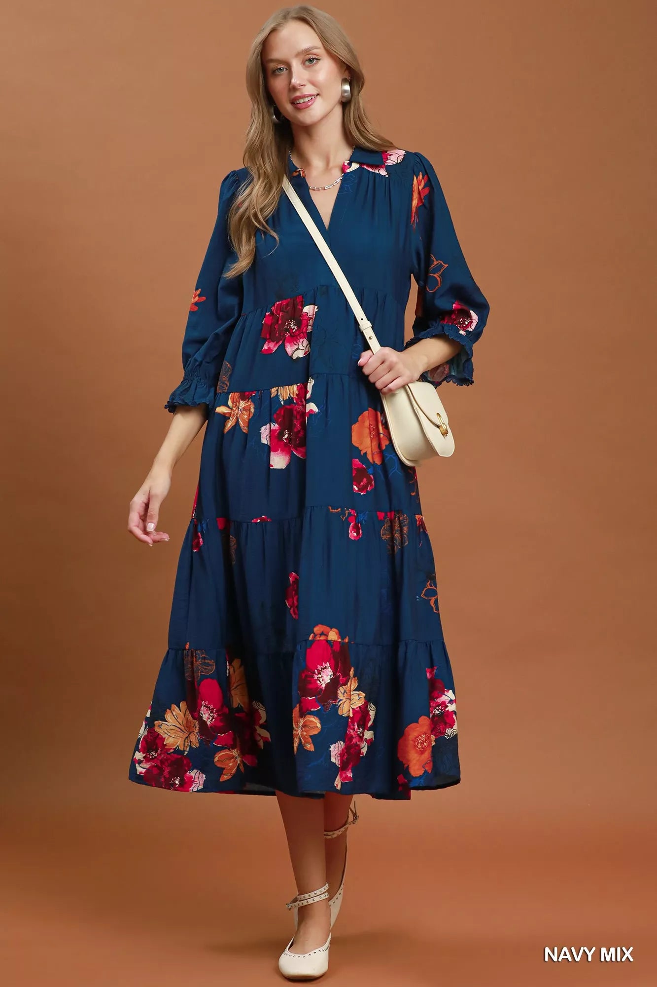 Umgee floral print tiered midi dress with puff sleeves, showcasing lightweight fabric and feminine design.