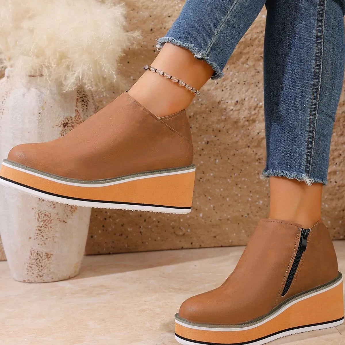 Women's round toe wedge ankle boots by Trendsi featuring stylish design and comfortable fit.