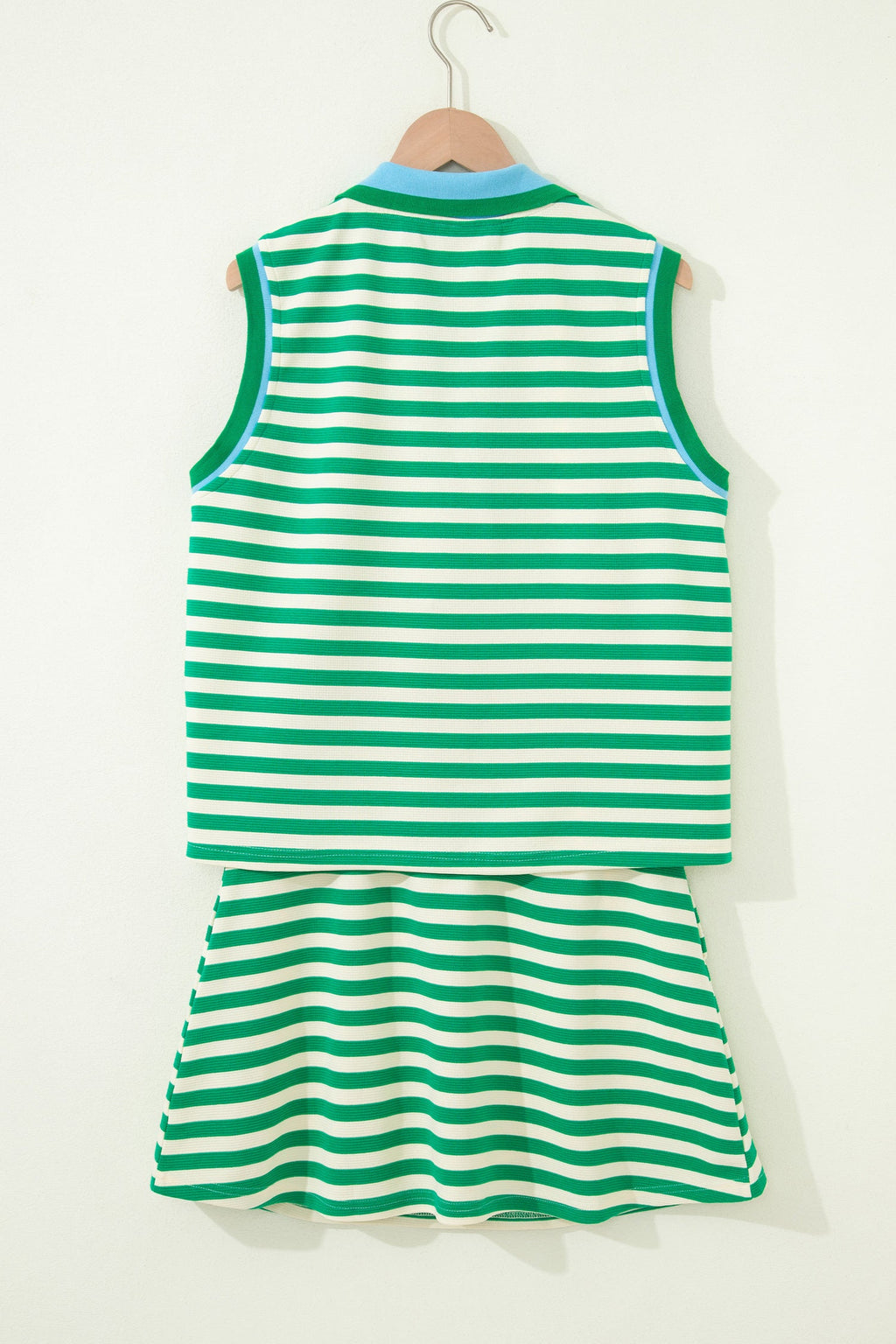 Threaded Pear Ruth sleeveless 2-piece skort set featuring a stylish top and matching skirt for a trendy, casual look.